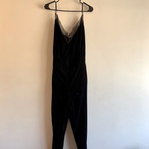 Black velvet jumpsuit from H&M